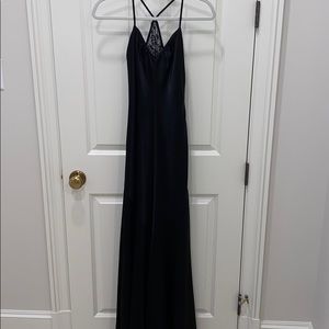 Women’s black formal dress with lace back